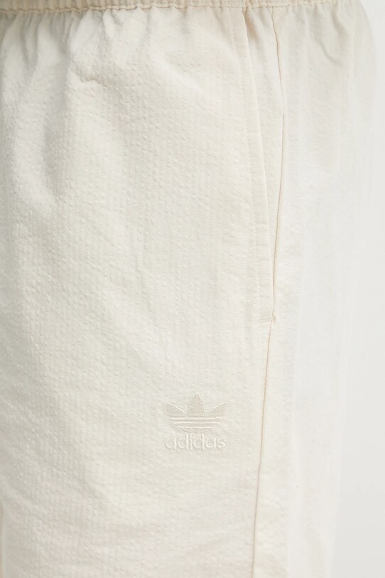 Бавовняні шорти adidas Originals Essential бежевий JD2461