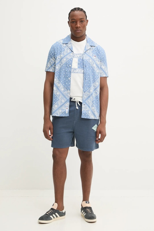 Bavlněné šortky Tommy Jeans DM0DM20936 námořnická modř SS25