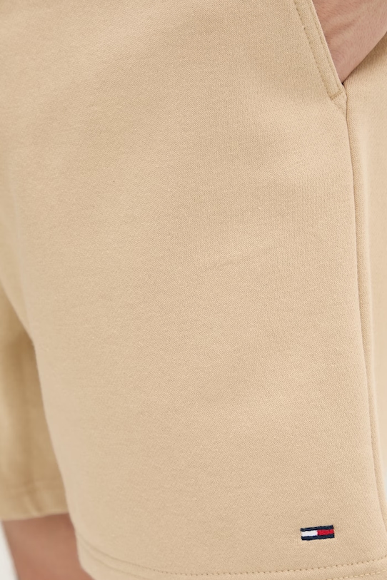 Tommy Jeans szorty dresowe męskie z bawełną beżowy DM0DM21931