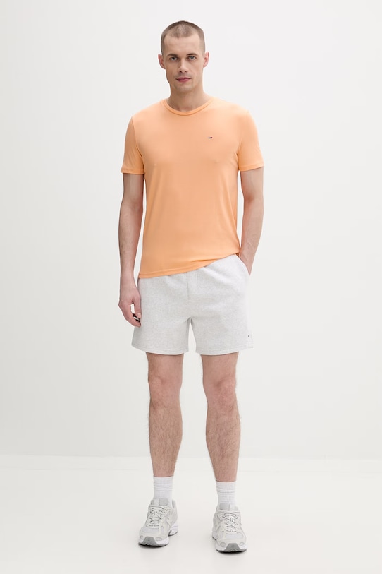 Tommy Jeans teplákové šortky pánske s bavlnou DM0DM21931 sivá SS26