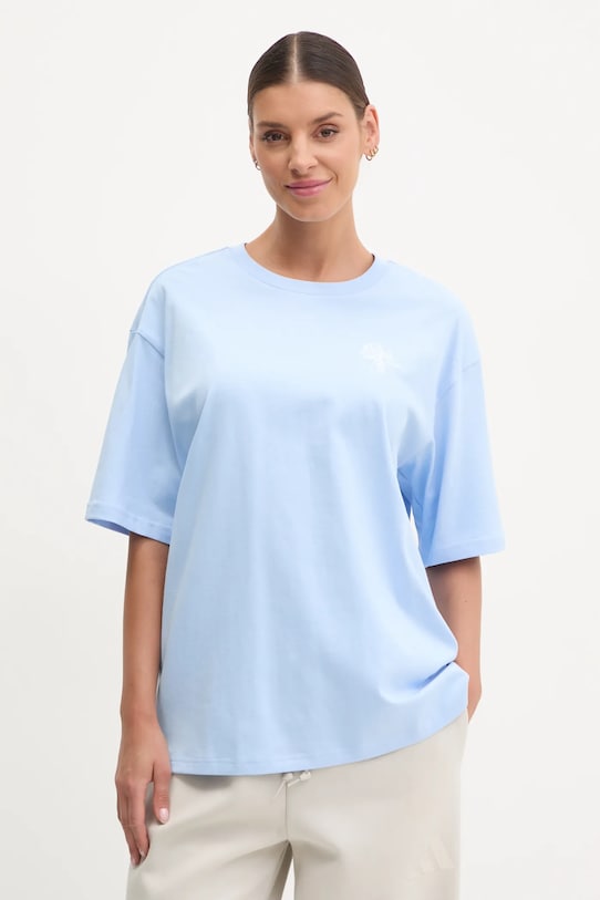 Бавовняна футболка adidas W C PHOTO TEE бавовна блакитний JN9090