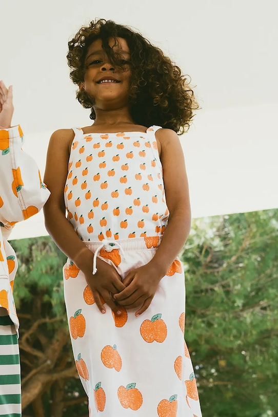 Tinycottons top dziecięcy APPLES STRAP TOP wzorzyste beżowy SS25.344