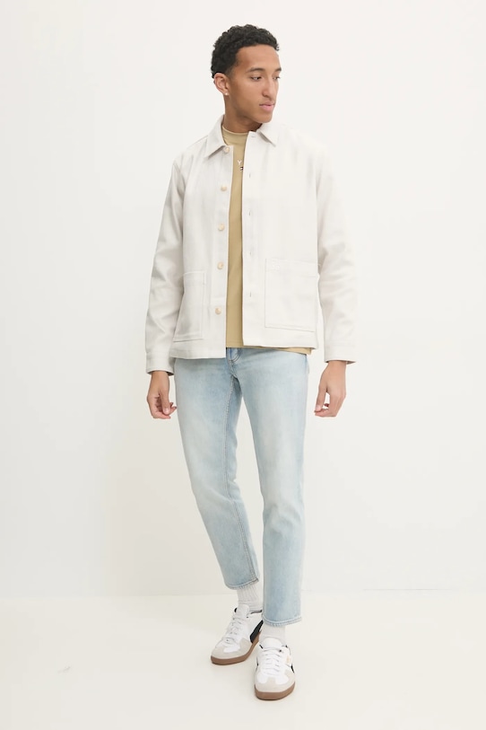 Bavlněné tričko Tommy Jeans DM0DM20744 béžová SS25