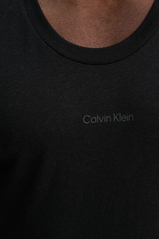 Тениска с лен Calvin Klein KM0KM01139 черен