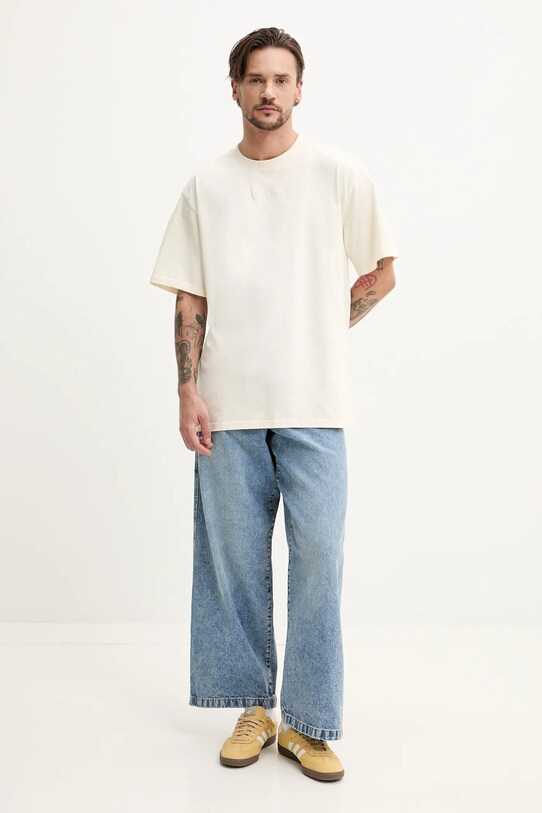 Бавовняна футболка Karl Kani 60300336 бежевий SS25