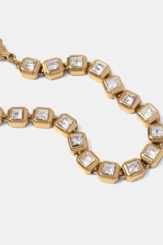 Guess bransoletka damska ze stali nierdzewnej ACE OF DIAMONDS JUBB06.174JW złoty SS26