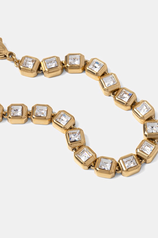 Guess bransoletka damska ze stali nierdzewnej ACE OF DIAMONDS JUBB06.174JW złoty SS26