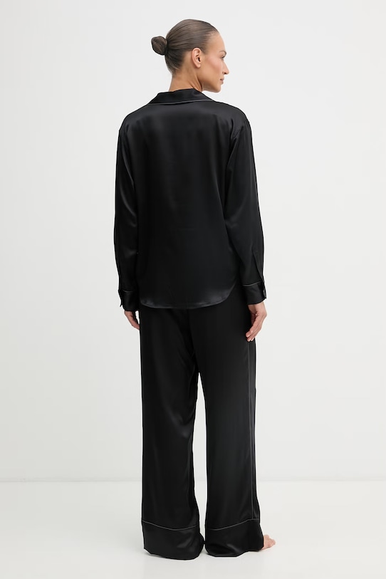 Abbigliamento Calvin Klein Underwear pigiama a due parti da donna LV00QS7625 nero