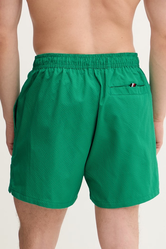 Oblečenie Tommy Hilfiger plavecké šortky pánske SUMMER UM0UM03750 zelená