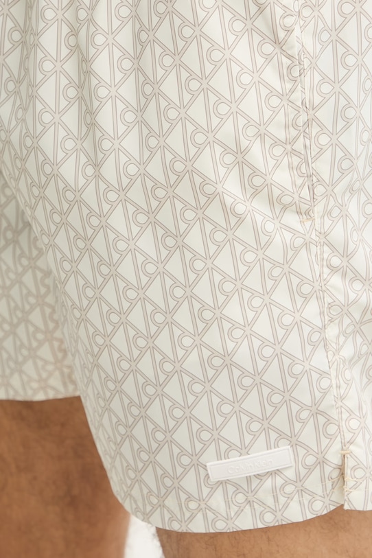 Calvin Klein plavecké šortky pánske béžová LV00N61027