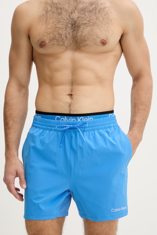 Calvin Klein kopalne kratke hlače moške LV00N61036 modra SS26