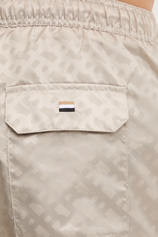 BOSS plavecké šortky mužské béžová 50561181