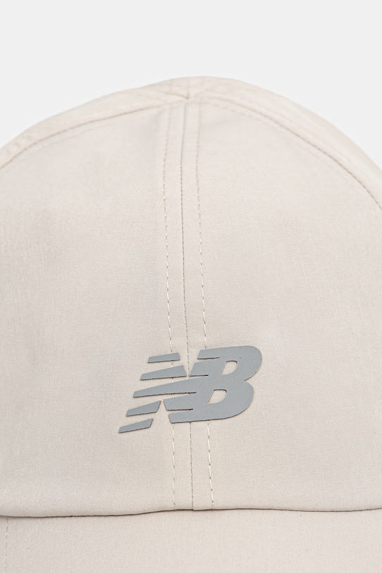 New Balance czapka z daszkiem LAH51002SHY beżowy SS26