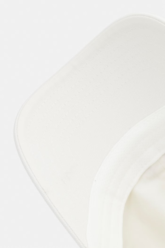 New Balance czapka z daszkiem bawełniana beżowy AC84454SST