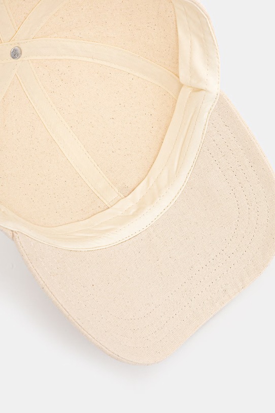 Maison Kitsuné czapka z daszkiem bawełniana Baby Fox beżowy OW06108WB0026