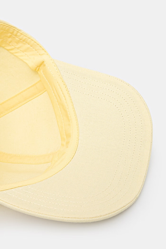 Maison Kitsuné czapka z daszkiem bawełniana Baby Fox żółty OW06108WB0026
