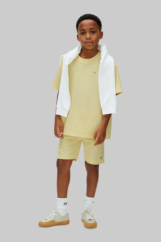 Calvin Klein Jeans komplet dziecięcy z bawełną żółty LVCKSJI19B.104.116.PPY2