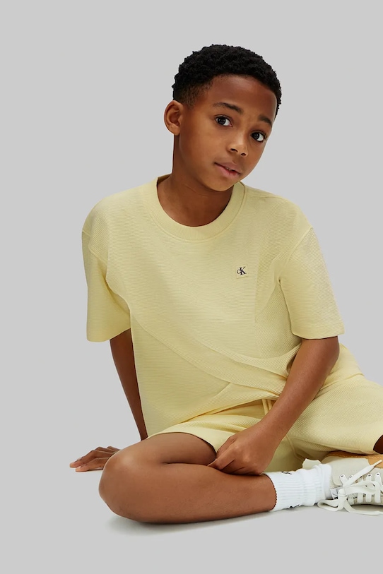 Calvin Klein Jeans komplet dziecięcy z bawełną LVCKSJI19B.104.116.PPY2 żółty