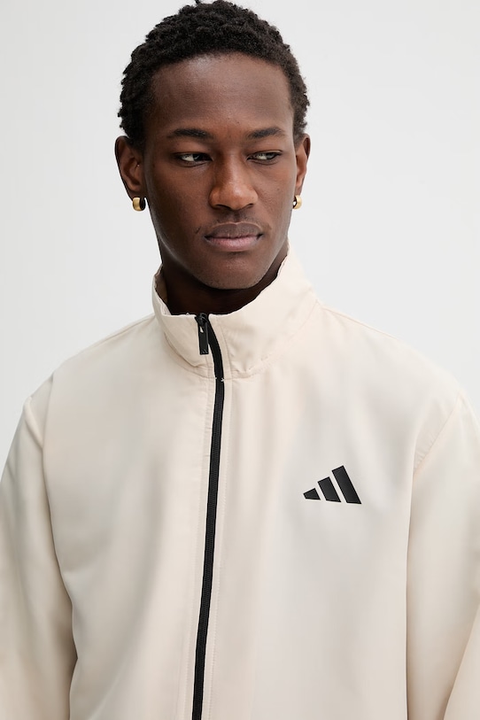 Спортивний костюм adidas KE5890 бежевий