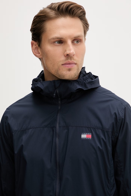 Tommy Jeans prechodná bunda pánska tmavomodrá DM0DM23112