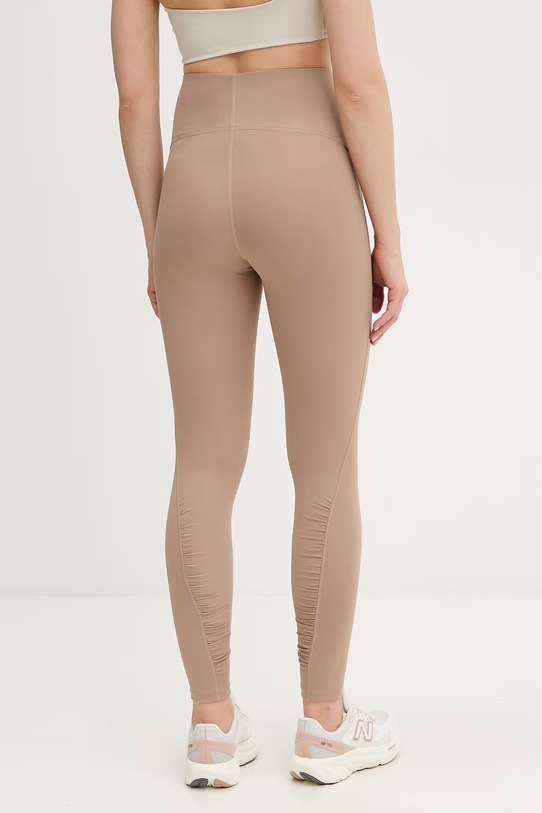 Odzież adidas by Stella McCartney legginsy treningowe KF5116 beżowy