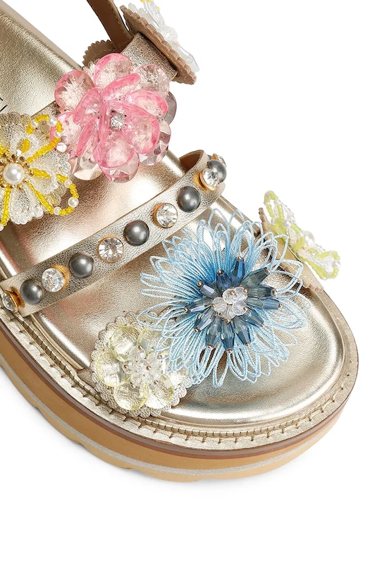 Kurt Geiger London sandali sulla banchina da donna in pelle Octavia Sling Flatform oro 5612461109