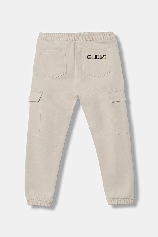 Παιδικό παντελόνι Guess N6RB06.KCCH0.PPY2 μπεζ SS26