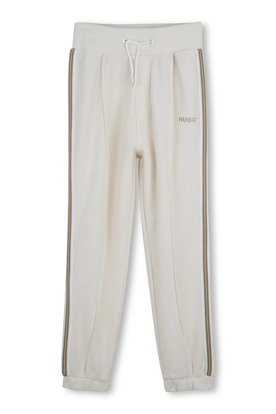 HUGO spodnie dresowe dziecięce bawełniane beżowy G00981.162.174