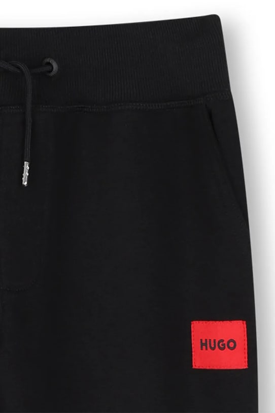 CHLAPEC Dětské tepláky HUGO G01182.162.174 černá