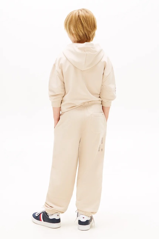 Tommy Hilfiger spodnie joggery dziecięce beżowy KB0KB10306.128.176.PPY2