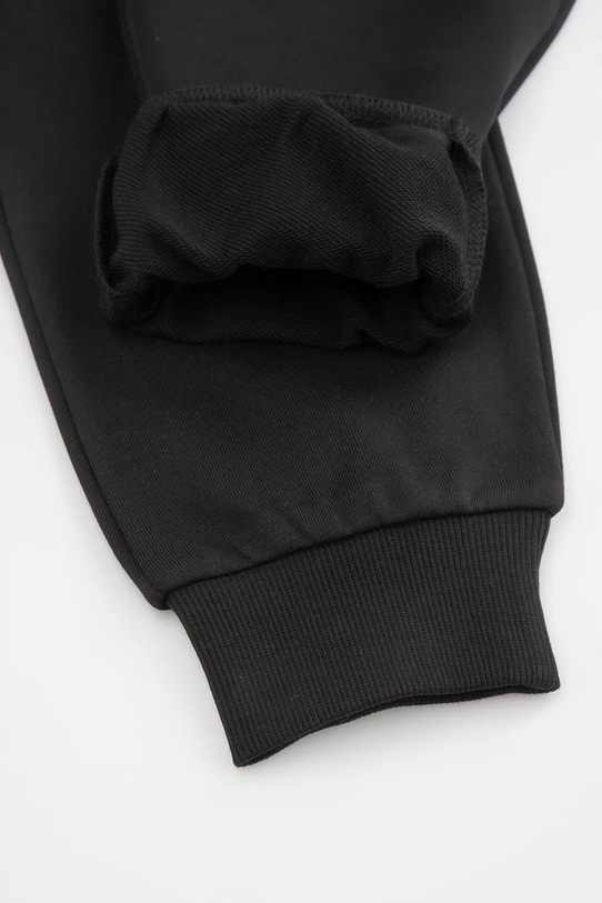 Детски памучен панталон Coccodrillo черен WC6120103VBA