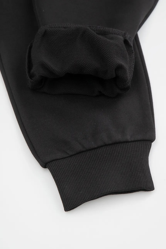 Детски памучен панталон Coccodrillo черен WC6120103VBA