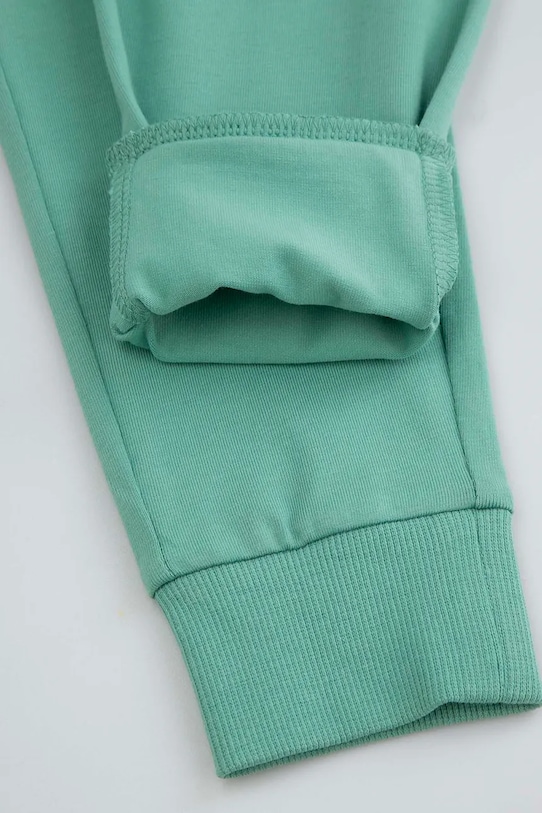 Dětské tepláky Coccodrillo tyrkysová WC6122101VBA