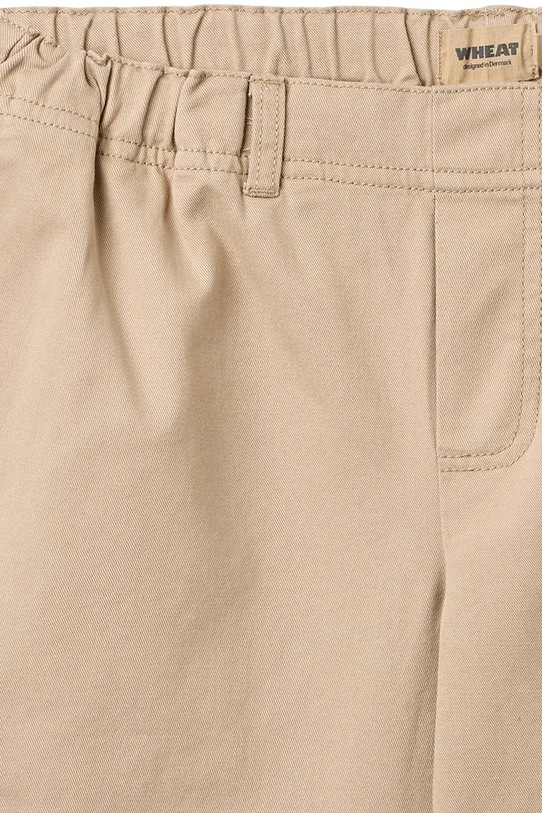 Chłopiec Wheat spodnie bawełniane dziecięce 2720.327.GOTS beżowy