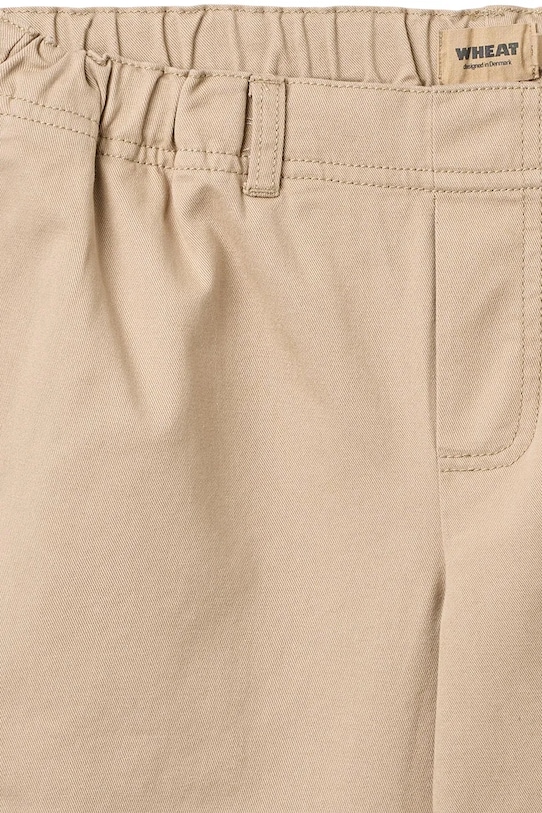 Chłopiec Wheat spodnie bawełniane dziecięce 2720.327.GOTS beżowy