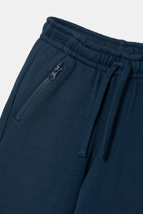 Chłopiec United Colors of Benetton spodnie dresowe dziecięce bawełniane 30DSGF05B.P.Stagionale granatowy