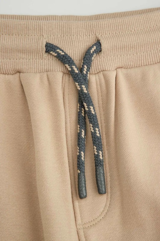 Coccodrillo donji dio trenirke za djecu s pamukom bež WC6120101NBJ