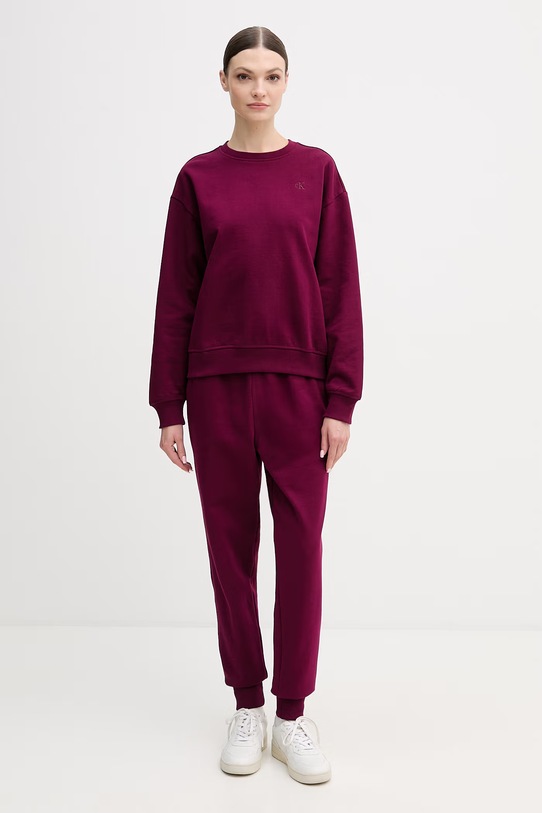 Calvin Klein Jeans spodnie dresowe LV047E236G bordowy SS26