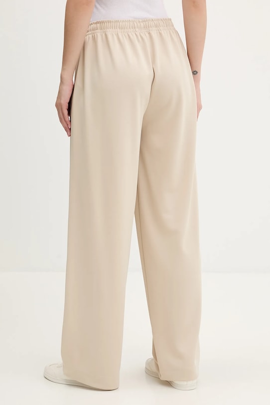 Odzież Tommy Jeans spodnie dresowe DW0DW22633 beżowy