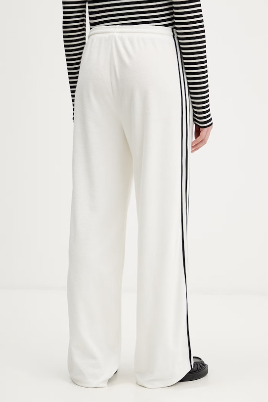 Odzież adidas Originals spodnie dresowe damskie Terry Towel Firebird KD1415 beżowy