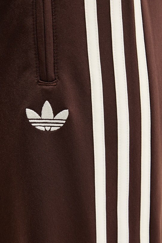 adidas Originals spodnie dresowe Firebird brązowy KG3706