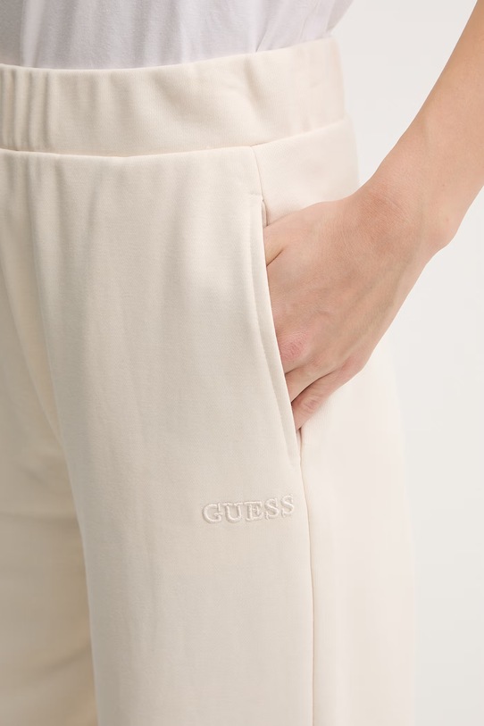 Guess spodnie dresowe YAYOI beżowy V6RB03.KD761