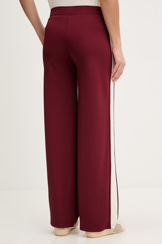 Odzież Guess spodnie dresowe MARLENE V6RB10.KCYF2 bordowy