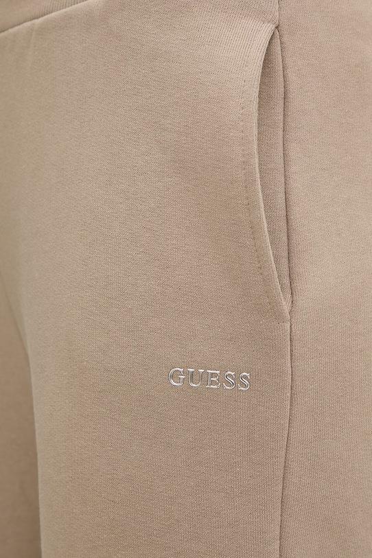 Odzież Guess spodnie dresowe NAT V6RB15.K9V31 beżowy