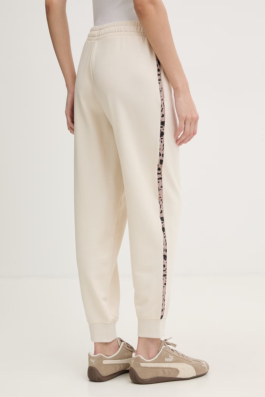 Odzież Puma spodnie dresowe damskie z bawełną Essential graphic animal 692464 beżowy