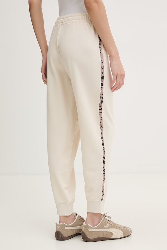 Odzież Puma spodnie dresowe damskie z bawełną Essential graphic animal 692464 beżowy