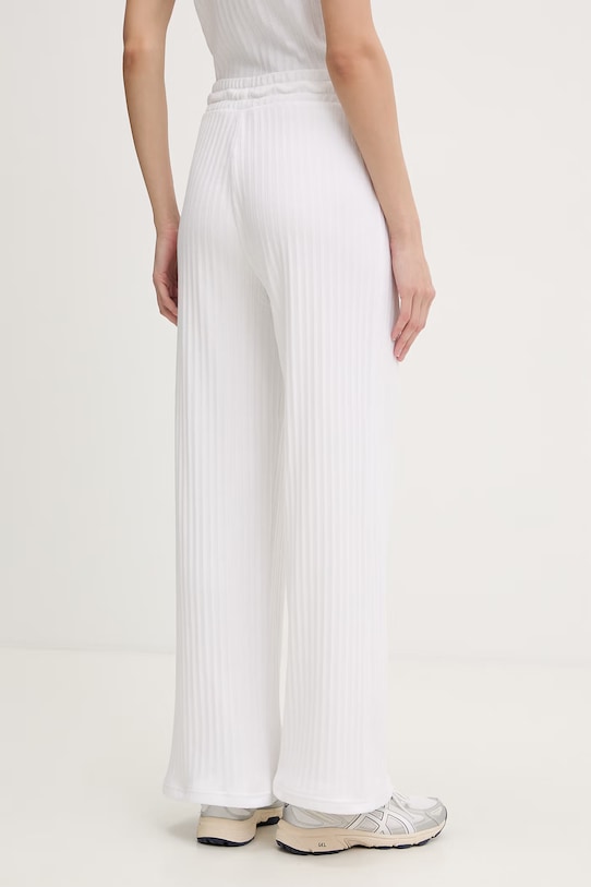 Odzież Puma spodnie dresowe damskie Comfort 693284 biały