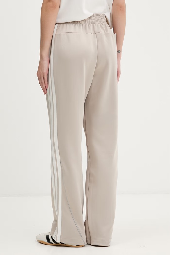 Odzież adidas spodnie dresowe damskie KF8285 beżowy
