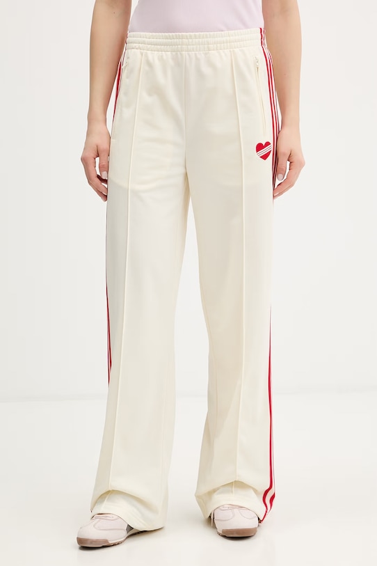 adidas Originals spodnie dresowe damskie beżowy KQ8056