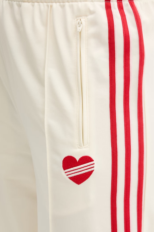 adidas Originals spodnie dresowe damskie KQ8056 beżowy